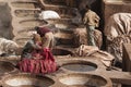 FEZ, MOROCCO Ã¢â¬â FEBRUARY 20, 2017 : Men working at the famous Chouara Tannery in the medina of Fez, Morocco Royalty Free Stock Photo